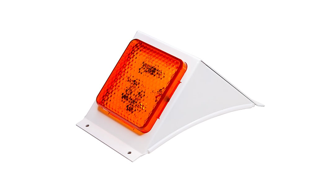 SB001C Amber Orange roof mount school bus light in a white mount for 4th (BE6) and 6th (BE7) generation Mitsubishi bus to comply with Victoria, Queensland, Tasmania, Northern Territory, Western Australia, ACT, South Australia school bus regulations