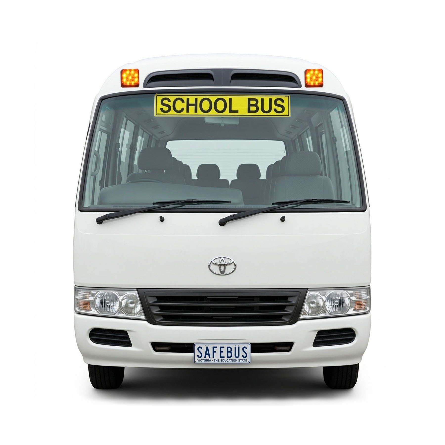 Photo of the front of a 2015 3rd generation Toyota Coaster bus with Safebus SB004 surface mount school bus lights and signage installed